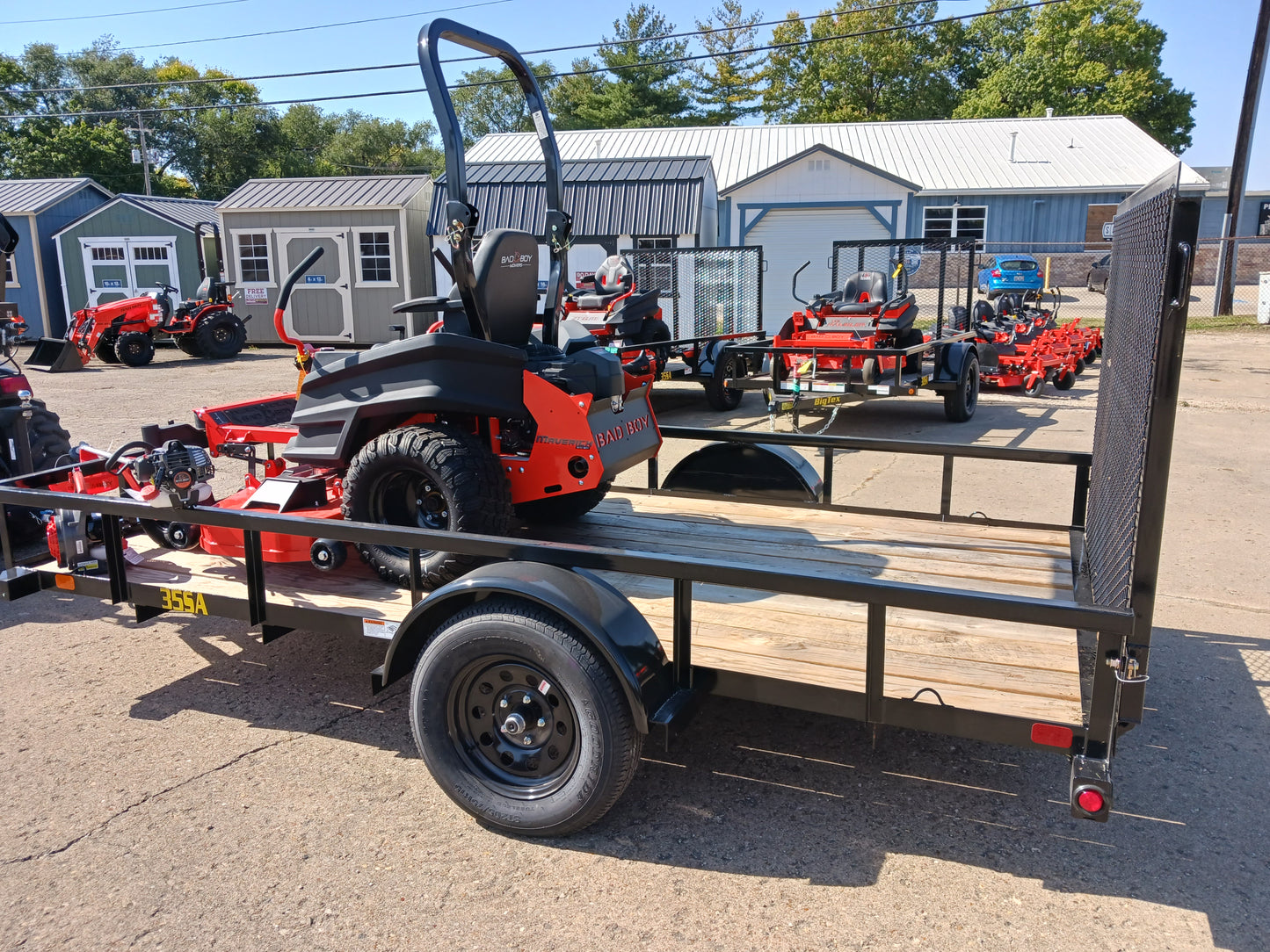 Bad Boy Maverick + 6x12 Big Tex Trailer + FREE Gas String Trimmer & Blower