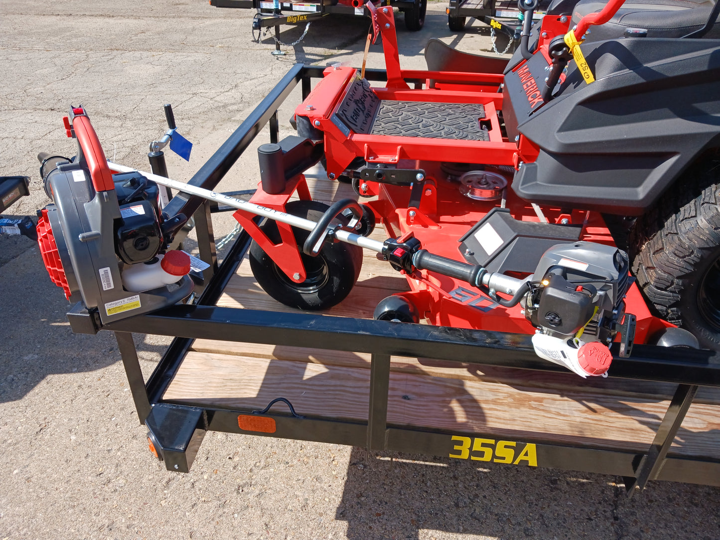 Bad Boy Maverick + 6x12 Big Tex Trailer + FREE Gas String Trimmer & Blower