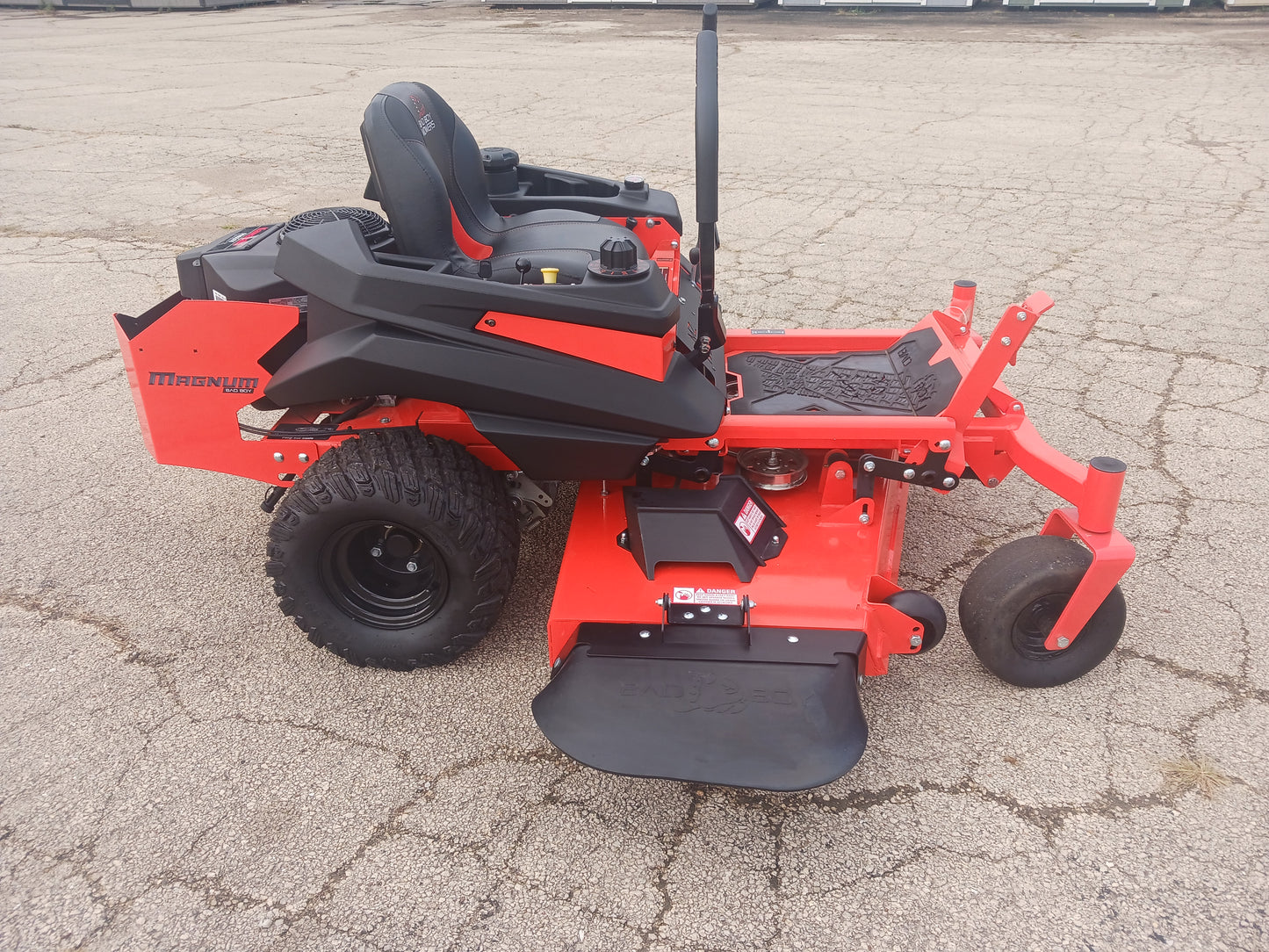 Bad Boy MZ Magnum Zero Turn Package – Big Tex Trailer + 80V Trimmer & Blower